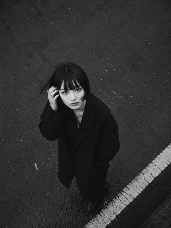 Illustrative adult portrait: Black and white portrait in dark tailoring